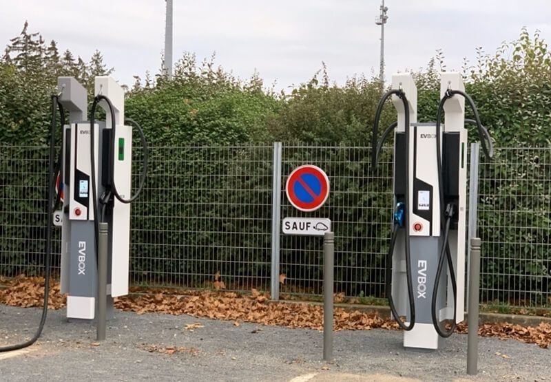 Two EVBox Ultroniq charging stations in a carpark