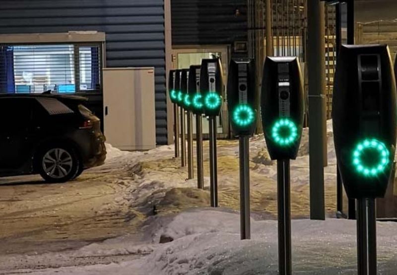 EVBox BusinessLine charging stations in snowy carpark at night