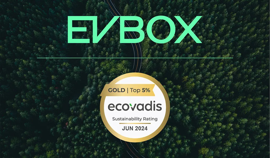 EVBox log and Ecovadis gold medal as an overlay on top of trees