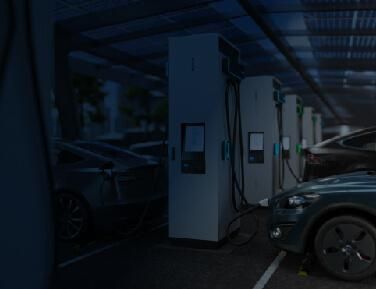 EVBox Iqon charging station next to car