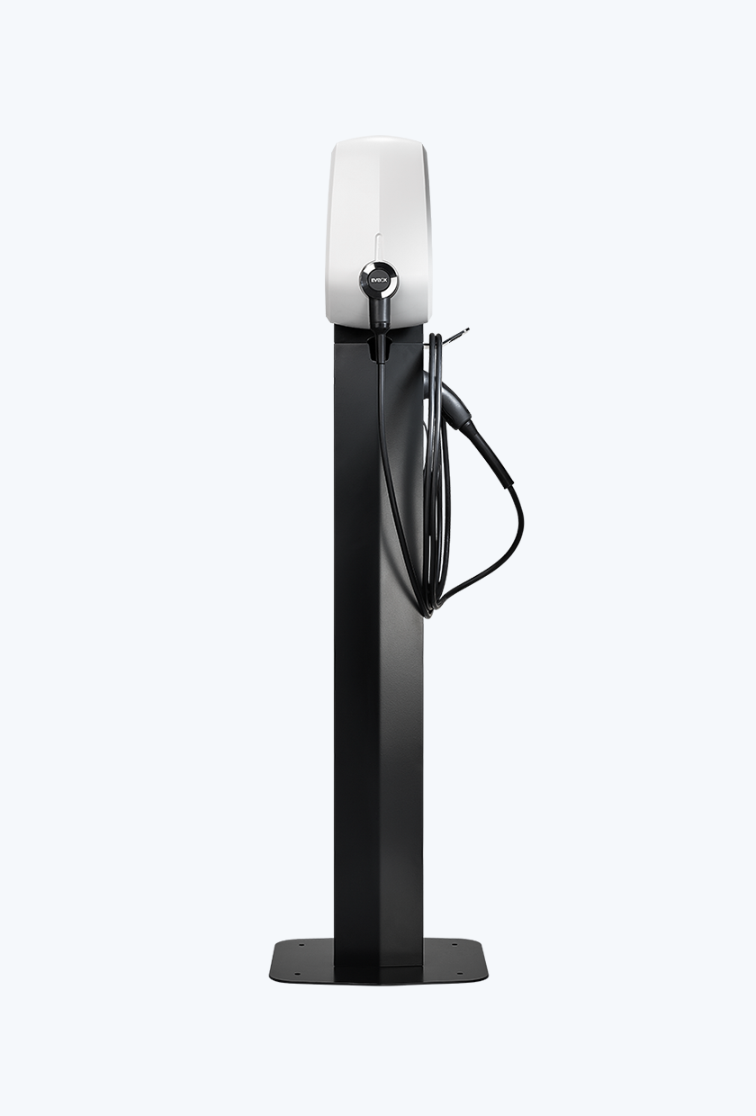 White version of a pole-mounted EVBox Elvi home charging station with a fixed cable